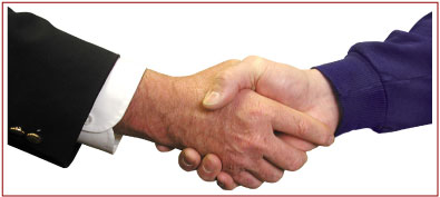 Photo two people shaking hands in Partnership.